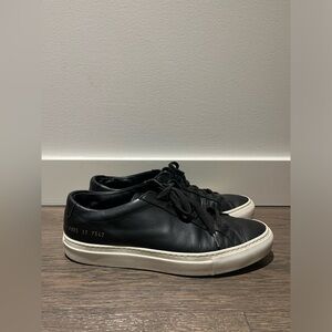 Woman by Common Projects Black Original Achilles Low Sneaker (Size 37)